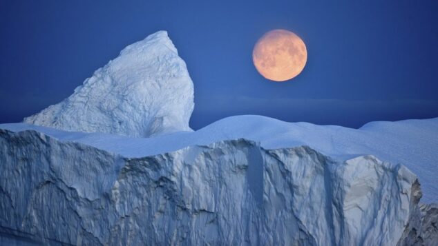 Moon and Arctic Background with Ice Caps